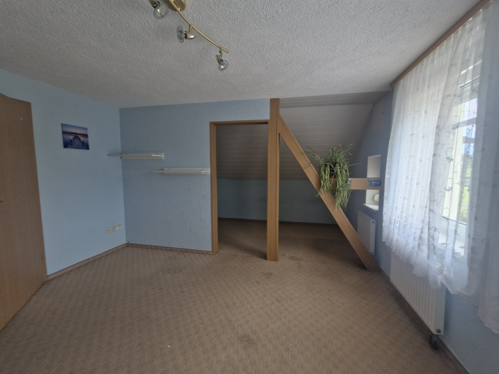 Zimmer 1 Dachgeschoss Zimmer 1 Dachgeschoss